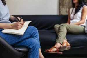 Woman meeting with drug and alcohol counselor